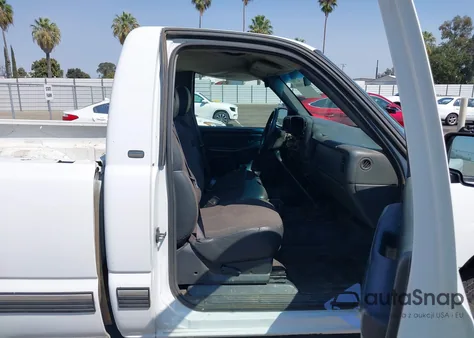 2001 Chevrolet Silverado 1500 из США, поврежденный, VIN 1GCEK14W71Z129211